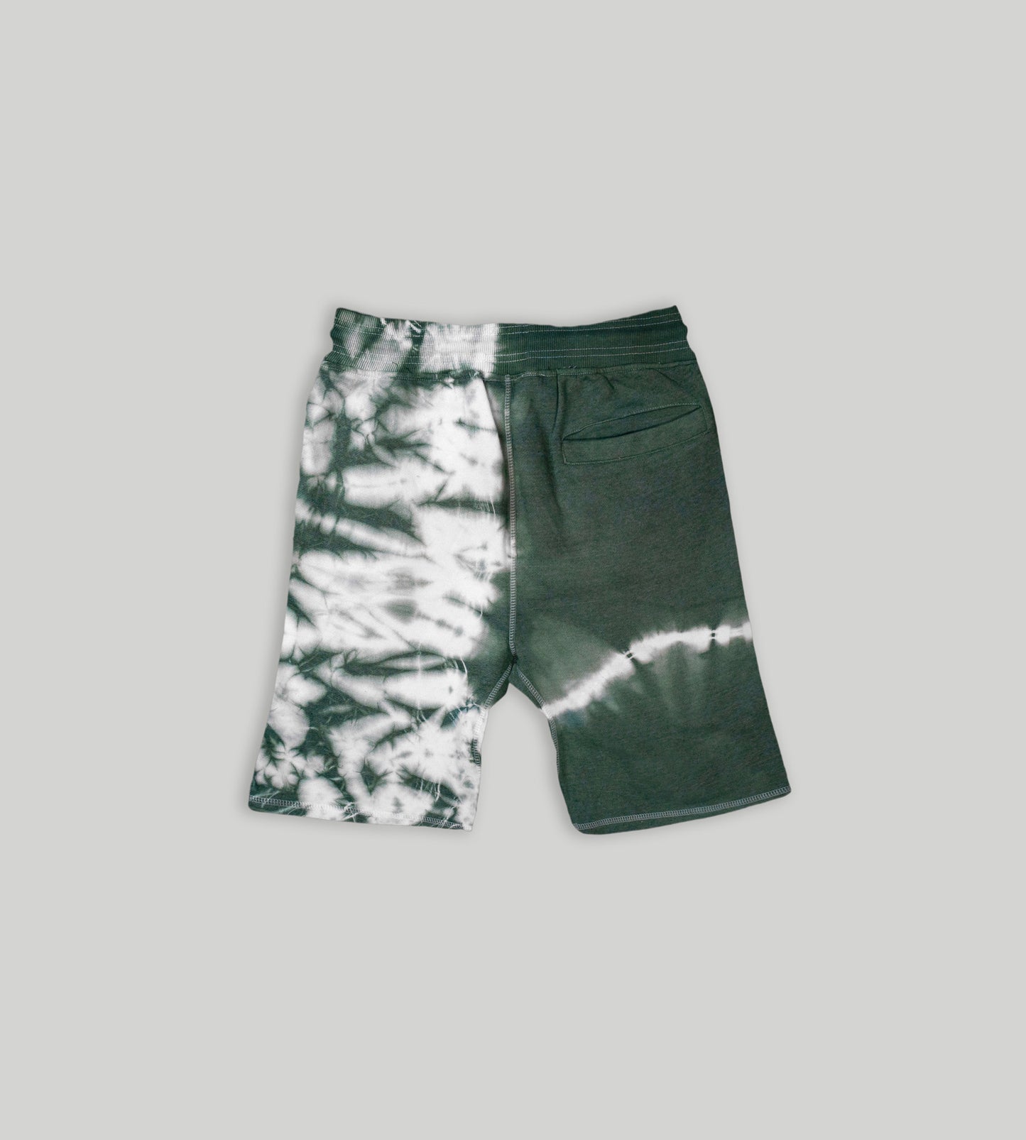 Men's tie dye green fleece shorts, knee length with drawstring.